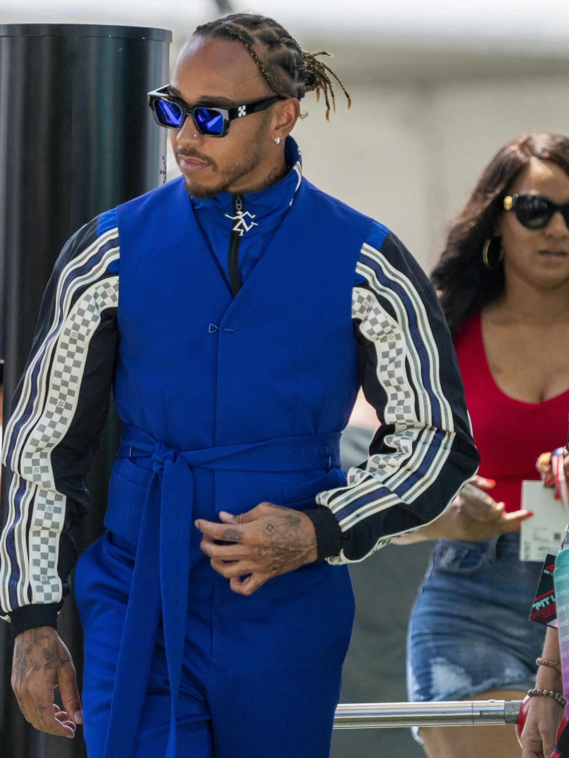  British Formula One driver Lewis Hamilton of Mercedes-AMG Petronas F1 Team and his physiotherapist and assistant Angela Cullen arrive in the paddock during the Formula One Grand Prix of Miami at the Miami International Autodrome in Miami, Florida on May 5, 2022. PUBLICATIONxINxGERxSUIxAUTxHUNxONLY FLA20220505104 SHAWNxTHEW