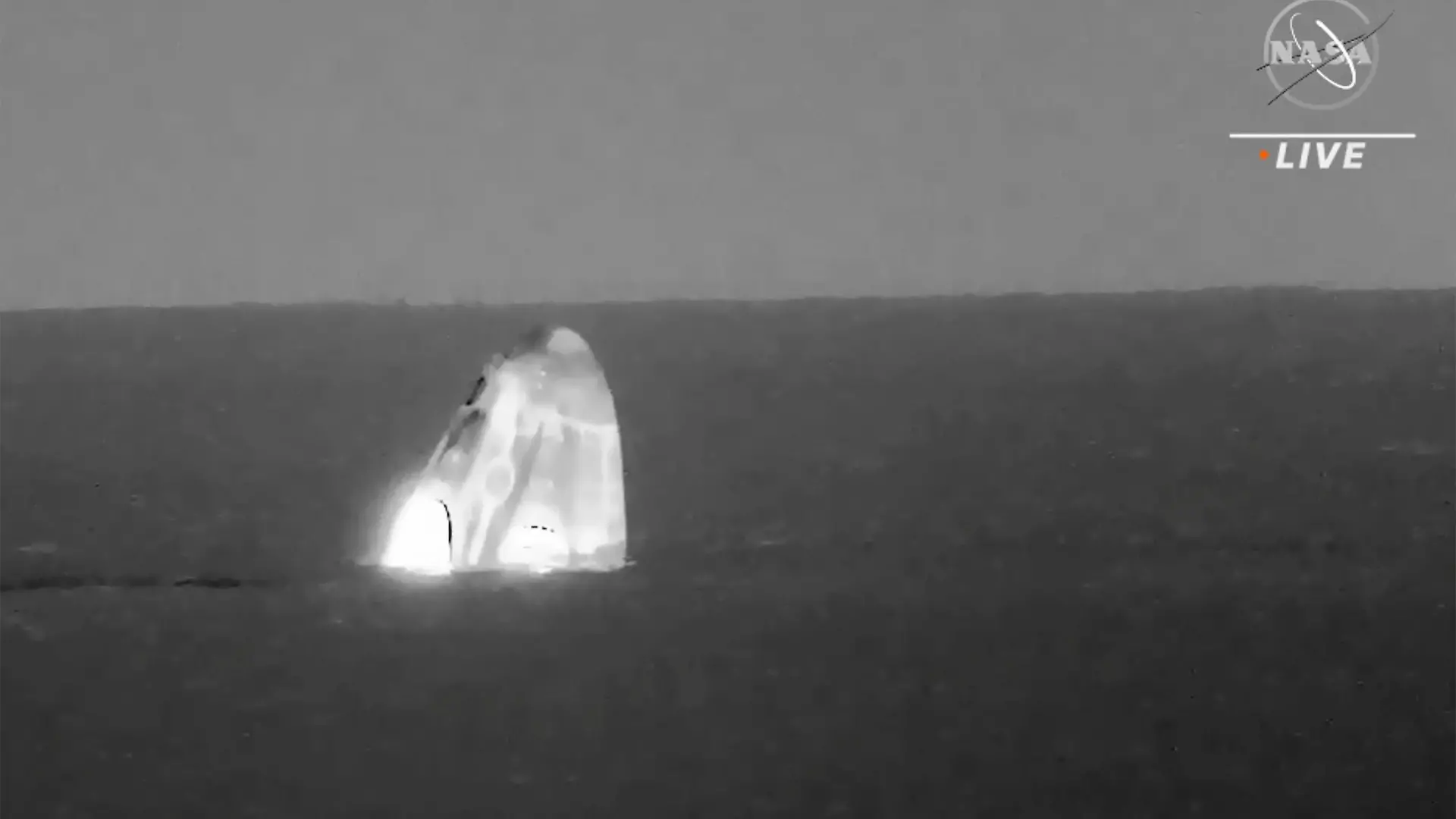 In this image made from video supplied by NASA, SpaceX Dragon space capsule splashes down in the Gulf of Mexico early Friday, May 6, 2022. NASA’s Raja Chari, Tom Marshburn and Kayla Barron, and the European Space Agency’s Matthias Maurer undocked from the International Space Station less than 24 hours earlier. (NASA via AP)