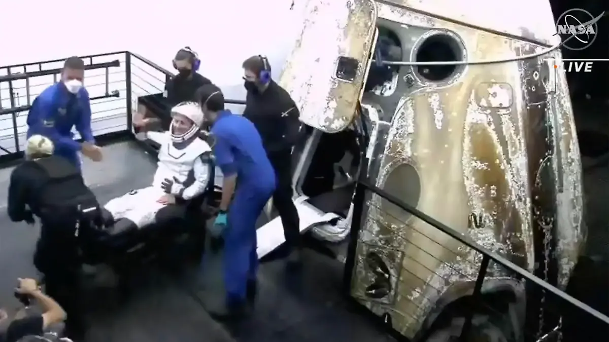 In this image made from video supplied by NASA, European Space Agency’s Matthias Maurer exits the SpaceX Dragon space capsule after splashing down in the Gulf of Mexico off Tampa, Florida, early Friday, May 6, 2022. Maurer along with NASA’s Raja Chari, Tom Marshburn and Kayla Barron undocked from the International Space Station less than 24 hours earlier. (NASA via AP)