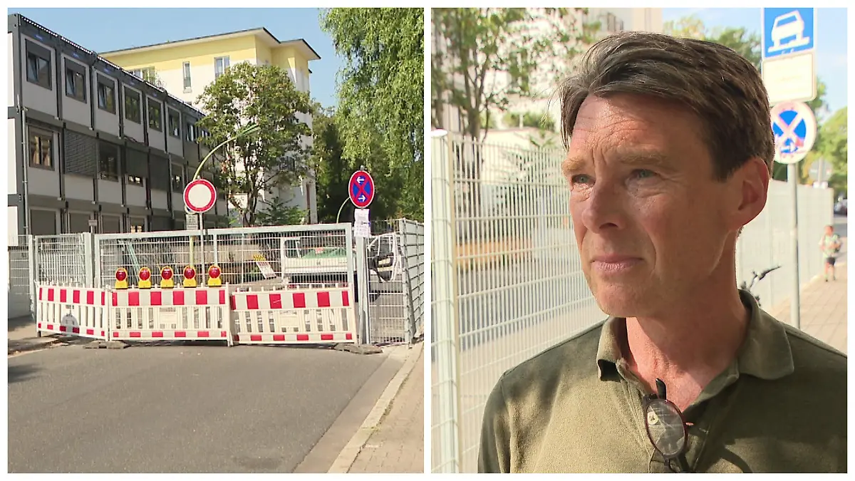 Dieser Pausenhof ist eine Straße! Zaun mitten auf der Fahrbahn!