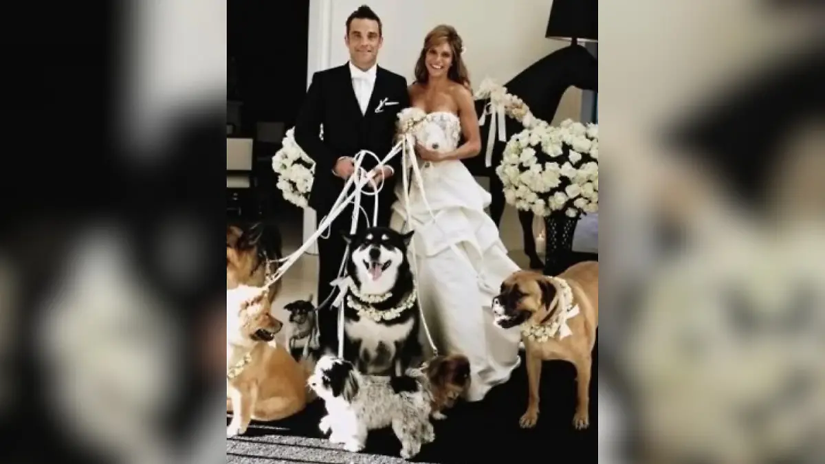 Vor 14 Jahren geben sie sich das Ja-Wort. Ihre Hunde dürfen bei der Hochzeit von Robbie und Ayda Williams fehlen. 