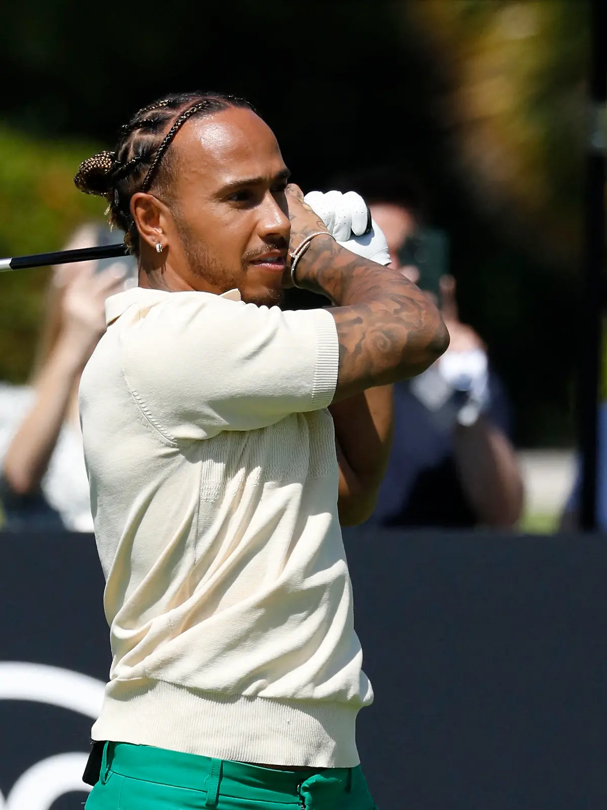 Formula One F1 - Tom Brady and Lewis Hamilton host an event in Miami - Miami Beach Golf Club, Miami, Florida, U.S., - May 4, 2022 Lewis Hamilton tees off as he plays golf with Tom Brady at Miami Beach Golf Club ahead of the Miami grand prix REUTERS/Marco Bello
