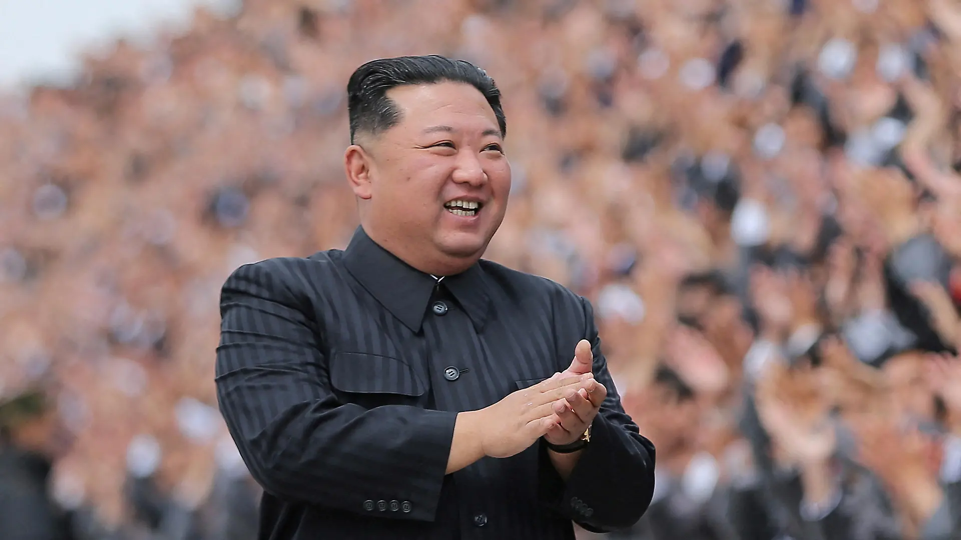 FILE PHOTO: North Korean leader Kim Jong Un applauds during a photo session with students and young workers in Pyongyang, North Korea, in this undated photo released by North Korea's Korean Central News Agency (KCNA) on May 1, 2022. KCNA via REUTERS    ATTENTION EDITORS - THIS IMAGE WAS PROVIDED BY A THIRD PARTY. REUTERS IS UNABLE TO INDEPENDENTLY VERIFY THIS IMAGE. NO THIRD PARTY SALES. SOUTH KOREA OUT. NO COMMERCIAL OR EDITORIAL SALES IN SOUTH KOREA./File Photo