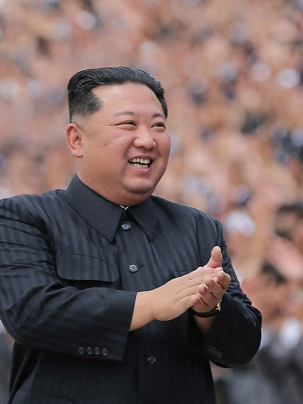 FILE PHOTO: North Korean leader Kim Jong Un applauds during a photo session with students and young workers in Pyongyang, North Korea, in this undated photo released by North Korea's Korean Central News Agency (KCNA) on May 1, 2022. KCNA via REUTERS    ATTENTION EDITORS - THIS IMAGE WAS PROVIDED BY A THIRD PARTY. REUTERS IS UNABLE TO INDEPENDENTLY VERIFY THIS IMAGE. NO THIRD PARTY SALES. SOUTH KOREA OUT. NO COMMERCIAL OR EDITORIAL SALES IN SOUTH KOREA./File Photo