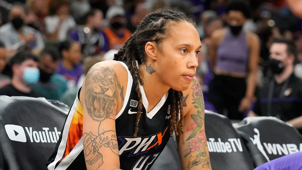 FILE - Phoenix Mercury center Brittney Griner sits during the first half of Game 2 of basketball's WNBA Finals against the Chicago Sky, Wednesday, Oct. 13, 2021, in Phoenix. Griner is easily the most prominent American citizen known to be jailed by a foreign government. Yet as a crucial hearing approaches next month, the case against her remains shrouded in mystery, with little clarity from the Russian prosecutors. (AP Photo/Rick Scuteri, File)