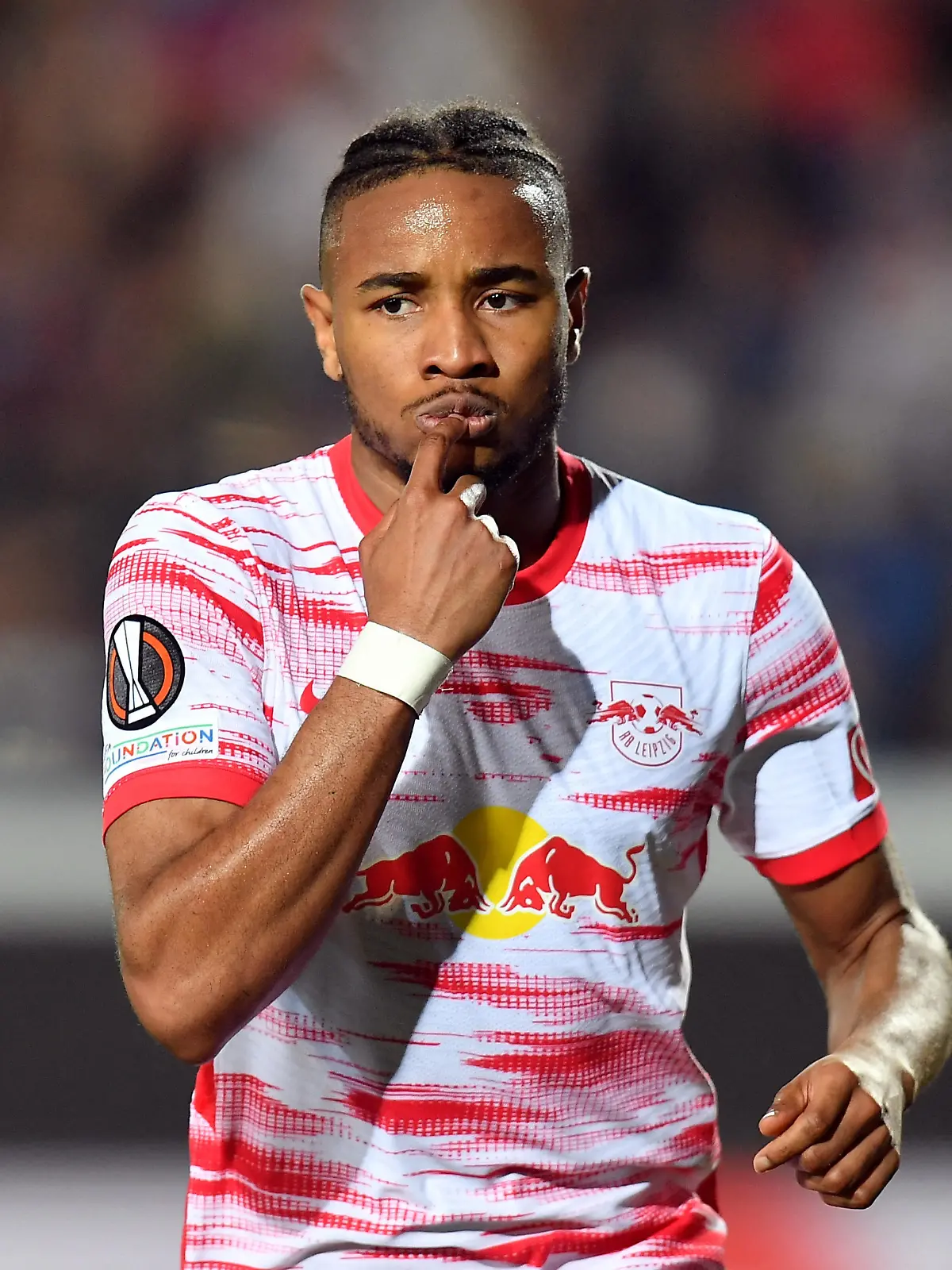 Soccer Football - Europa League - Quarter Final - Second Leg - Atalanta v RB Leipzig - Stadio Atleti Azzurri, Bergamo, Italy - April 14, 2022 RB Leipzig's Christopher Nkunku celebrates scoring their second goal REUTERS/Daniele Mascolo