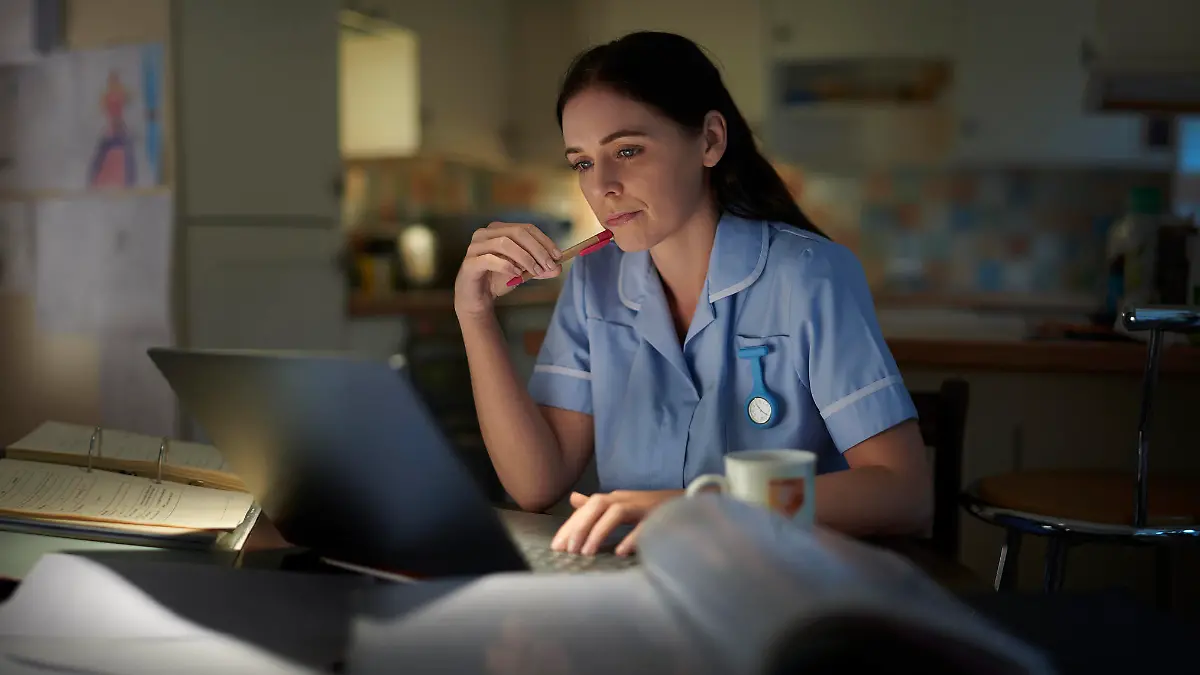 medical student burning the midnight oil after a long shift