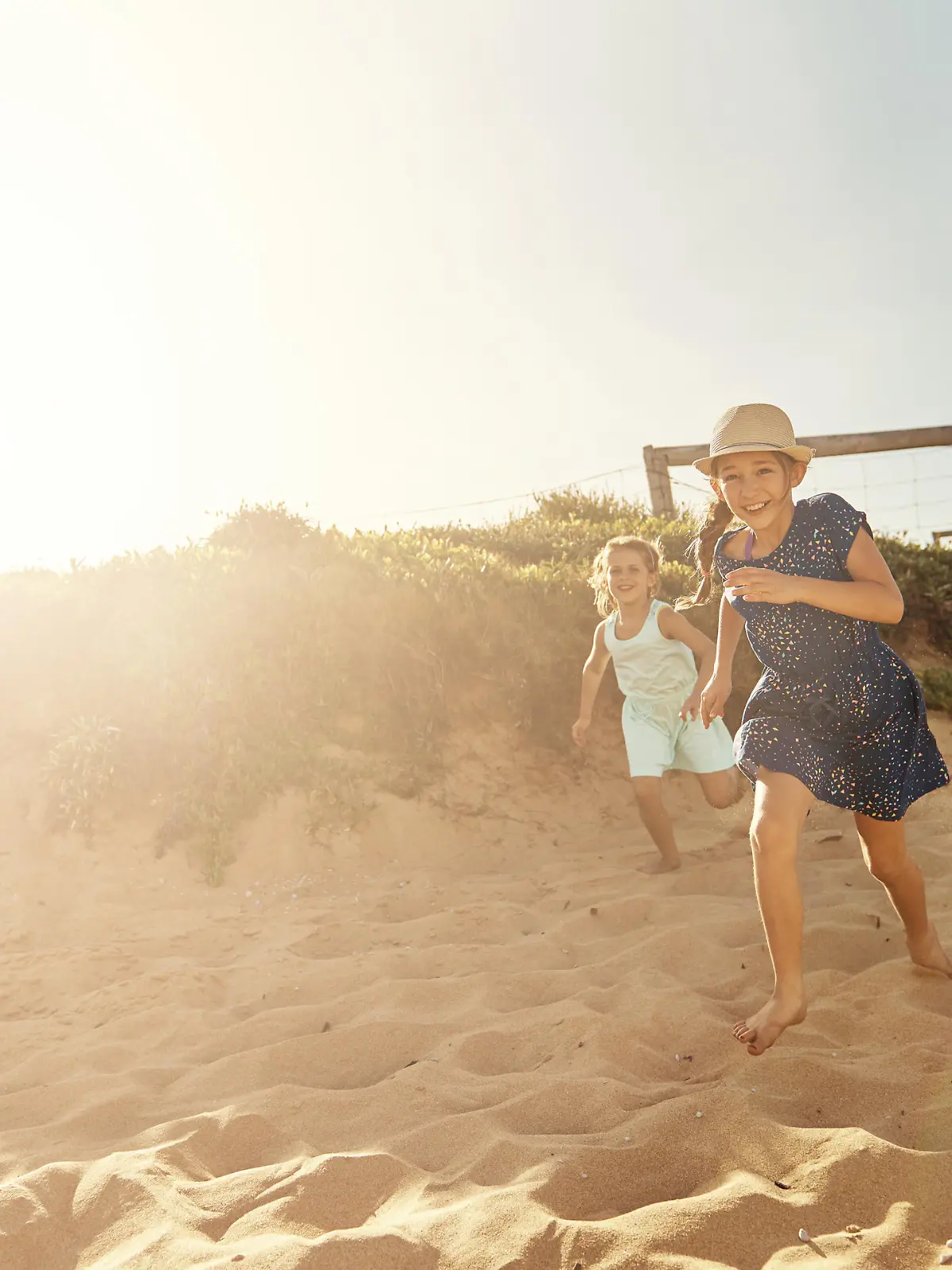 Shot of a young family arriving at the beachimage806237.jpg