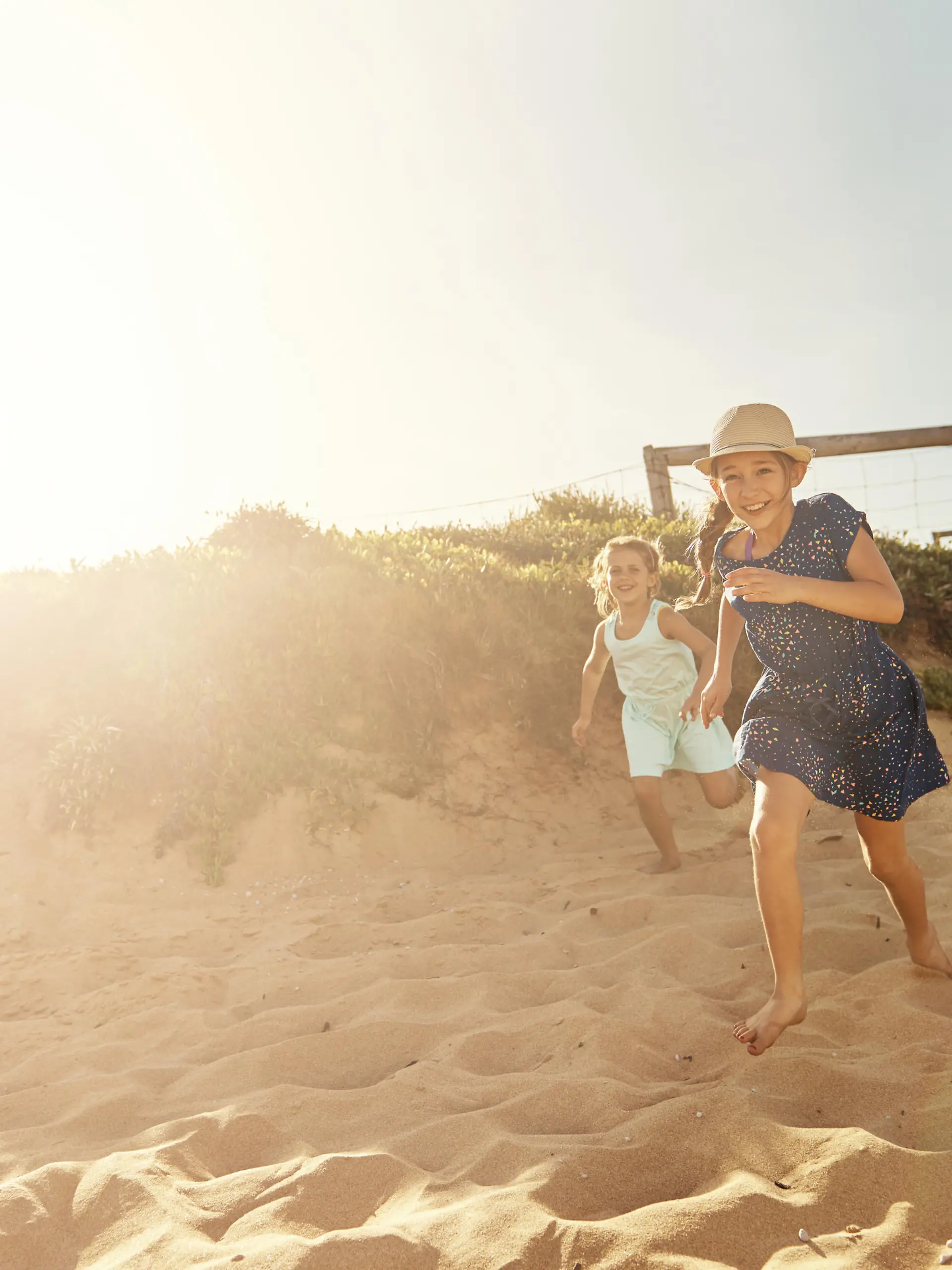 Shot of a young family arriving at the beachimage806237.jpg