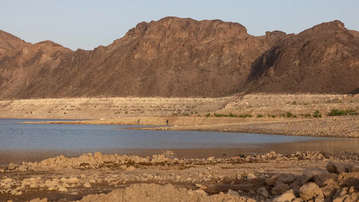 The sun sets on the shrinking Lake Mead, where water levels have declined dramatically to lows not seen since the reservoir was filled after the construction of Hoover Dam, as climate change and growing demand for its water shrink the Colorado River and create challenges, in Boulder City, Nevada, U.S., April 16, 2022. Picture taken April 16, 2022. REUTERS/Caitlin Ochs