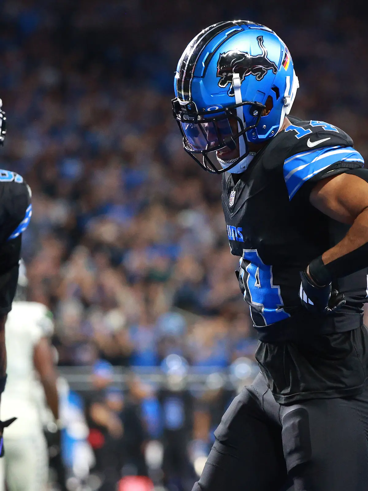 Amon-Ra St. Brown feiert seinen Touchdown 