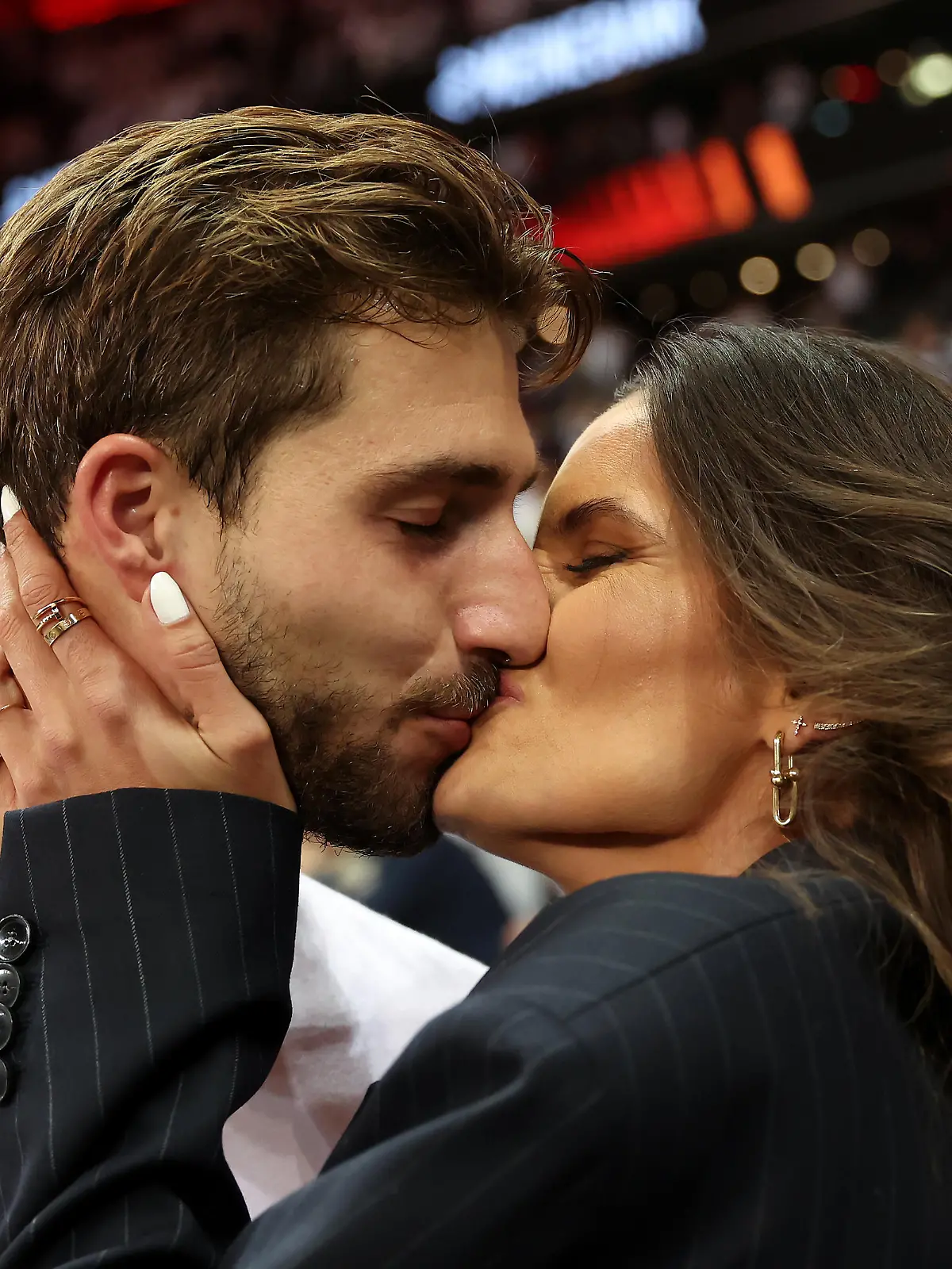 FRANKFURT AM MAIN, GERMANY - MAY 05: Kevin Trapp of Eintracht Frankfurt celebrates with girlfriend, Izabel Goulart during the UEFA Europa League Semi Final Leg Two match between Eintracht Frankfurt and West Ham United at Deutsche Bank Park on May 05, 2022 in Frankfurt am Main, Germany. (Photo by Alex Grimm/Getty Images)