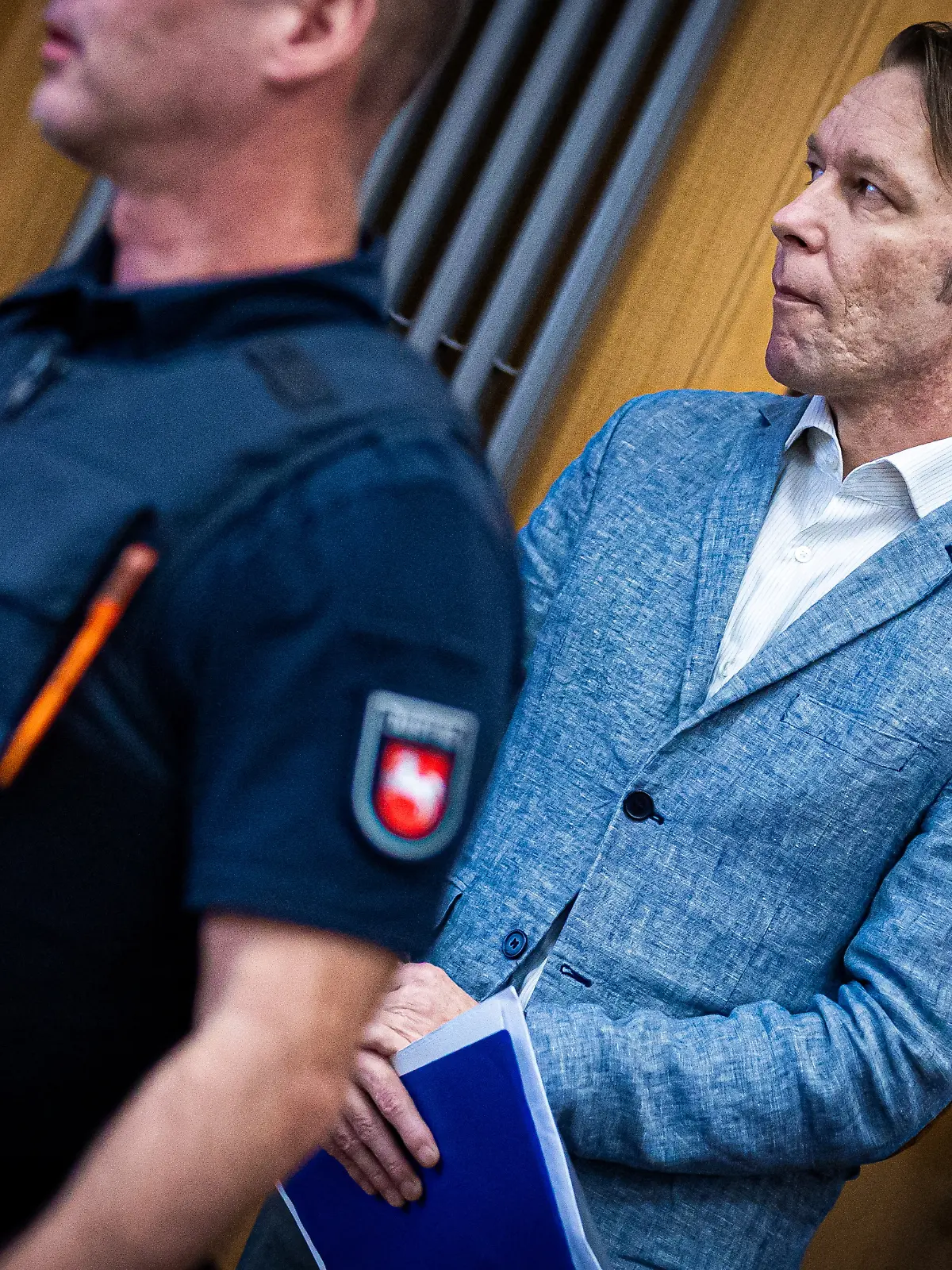 A man, who is a suspect in the disappearance of British toddler Madeleine McCann in Portugal, appears for trial on unrelated sexual assault charges in Germany