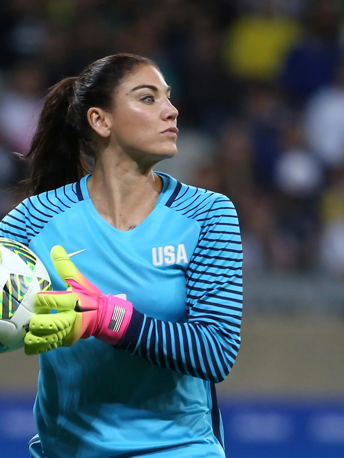 FILE - United States' goalkeeper Hope Solo takes the ball during a women's soccer game at the Rio Olympics against New Zealand in Belo Horizonte, Brazil, Aug. 3, 2016. Former U.S. women’s national team star goalkeeper Solo was arrested after police say she was found passed out behind the wheel of a vehicle in North Carolina with her two children inside. A police report said Solo was arrested on Thursday, March 31, 2022, in a shopping center parking lot in Winston-Salem and charged with driving while impaired, resisting a public officer and misdemeanor child abuse. (AP Photo/Eugenio Savio, File)