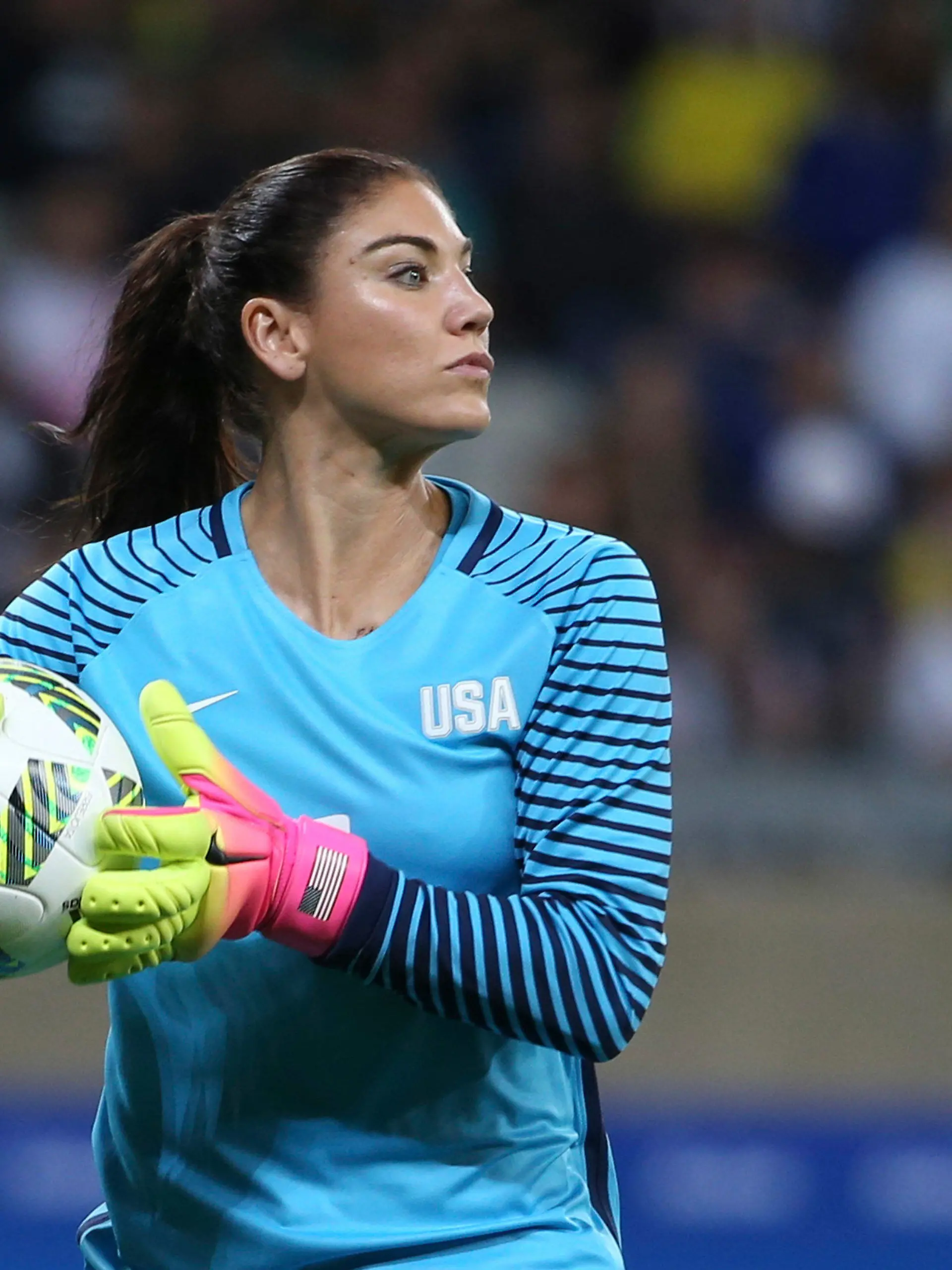 FILE - United States' goalkeeper Hope Solo takes the ball during a women's soccer game at the Rio Olympics against New Zealand in Belo Horizonte, Brazil, Aug. 3, 2016. Former U.S. women’s national team star goalkeeper Solo was arrested after police say she was found passed out behind the wheel of a vehicle in North Carolina with her two children inside. A police report said Solo was arrested on Thursday, March 31, 2022, in a shopping center parking lot in Winston-Salem and charged with driving while impaired, resisting a public officer and misdemeanor child abuse. (AP Photo/Eugenio Savio, File)