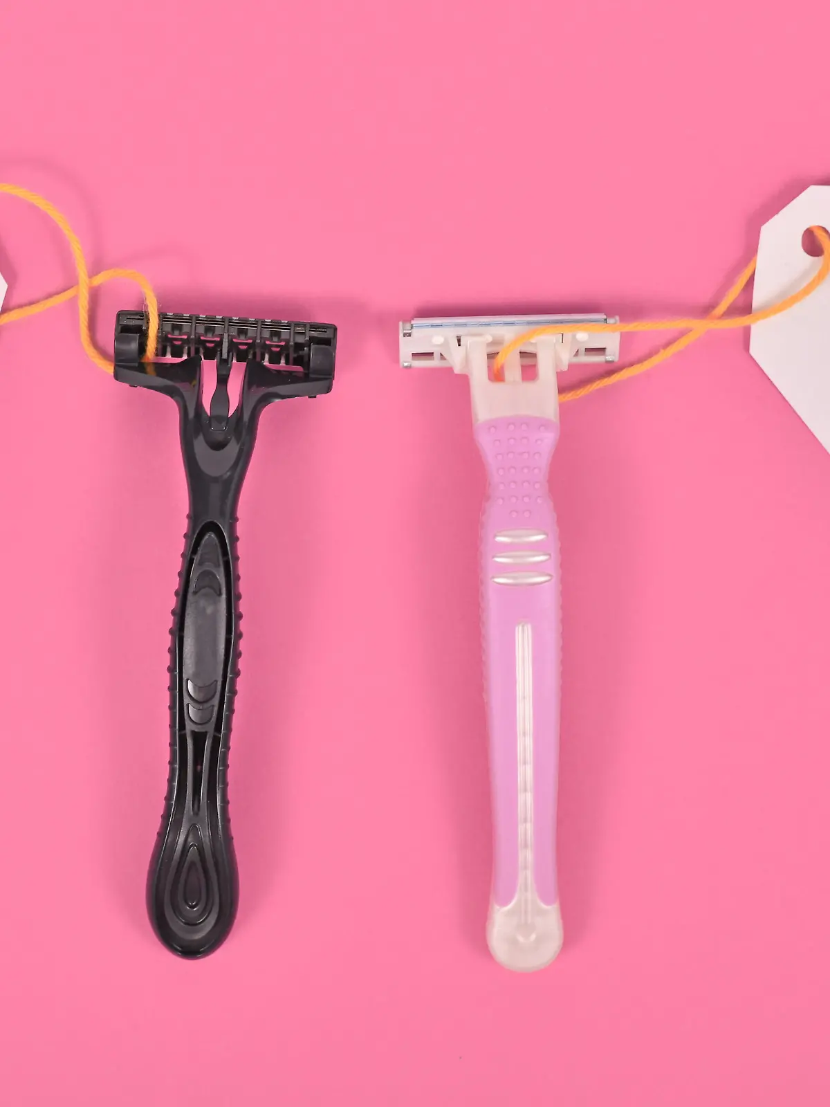 Concept for pink tax showing pink and black razor aimed at specific genders with different price tags