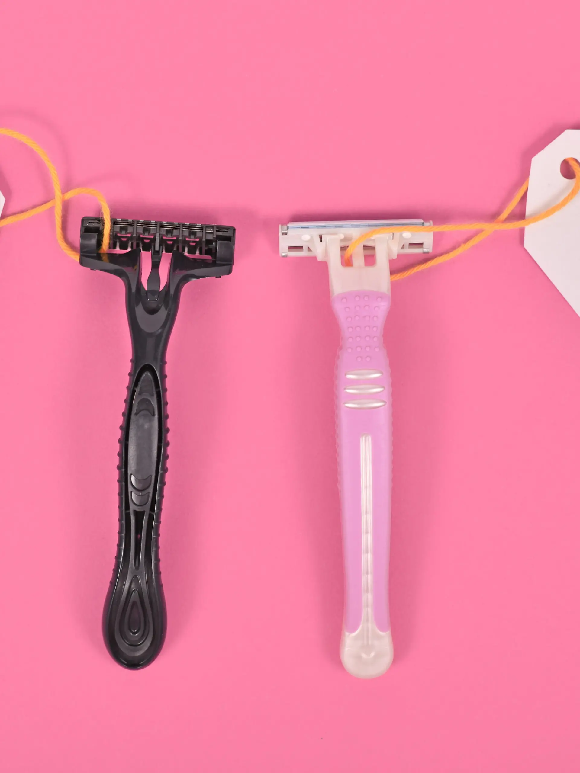 Concept for pink tax showing pink and black razor aimed at specific genders with different price tags
