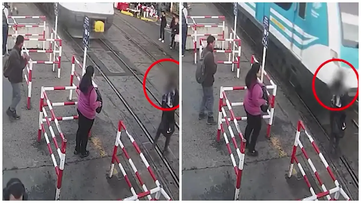 Mann hat nur Augen fürs Handy - dann kommt der Zug Schock am Bahnübergang!