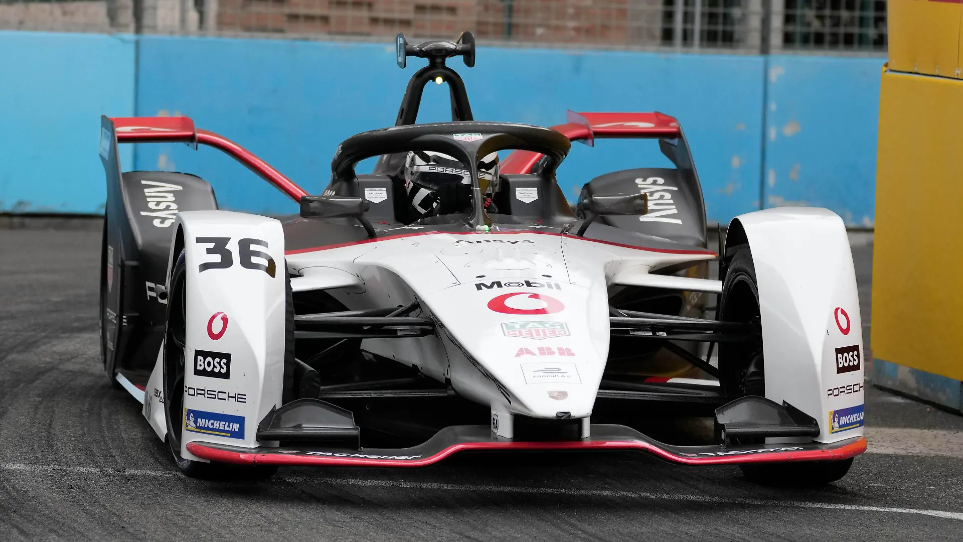 Andre Lotterer steers his TAG Heuer Porsche Formula E Team during a Formula E Rome ePrix auto race in E.U.R., Rome, Saturday, April 9, 2022. (AP Photo/Andrew Medichini)
