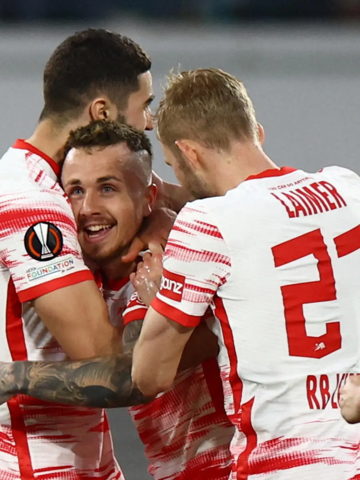 Soccer Football - Europa League - Semi Final - First Leg - RB Leipzig v Rangers - Red Bull Arena, Leipzig, Germany - April 28, 2022 RB Leipzig's Angelino celebrates scoring their first goal with teammates REUTERS/Lisi Niesner