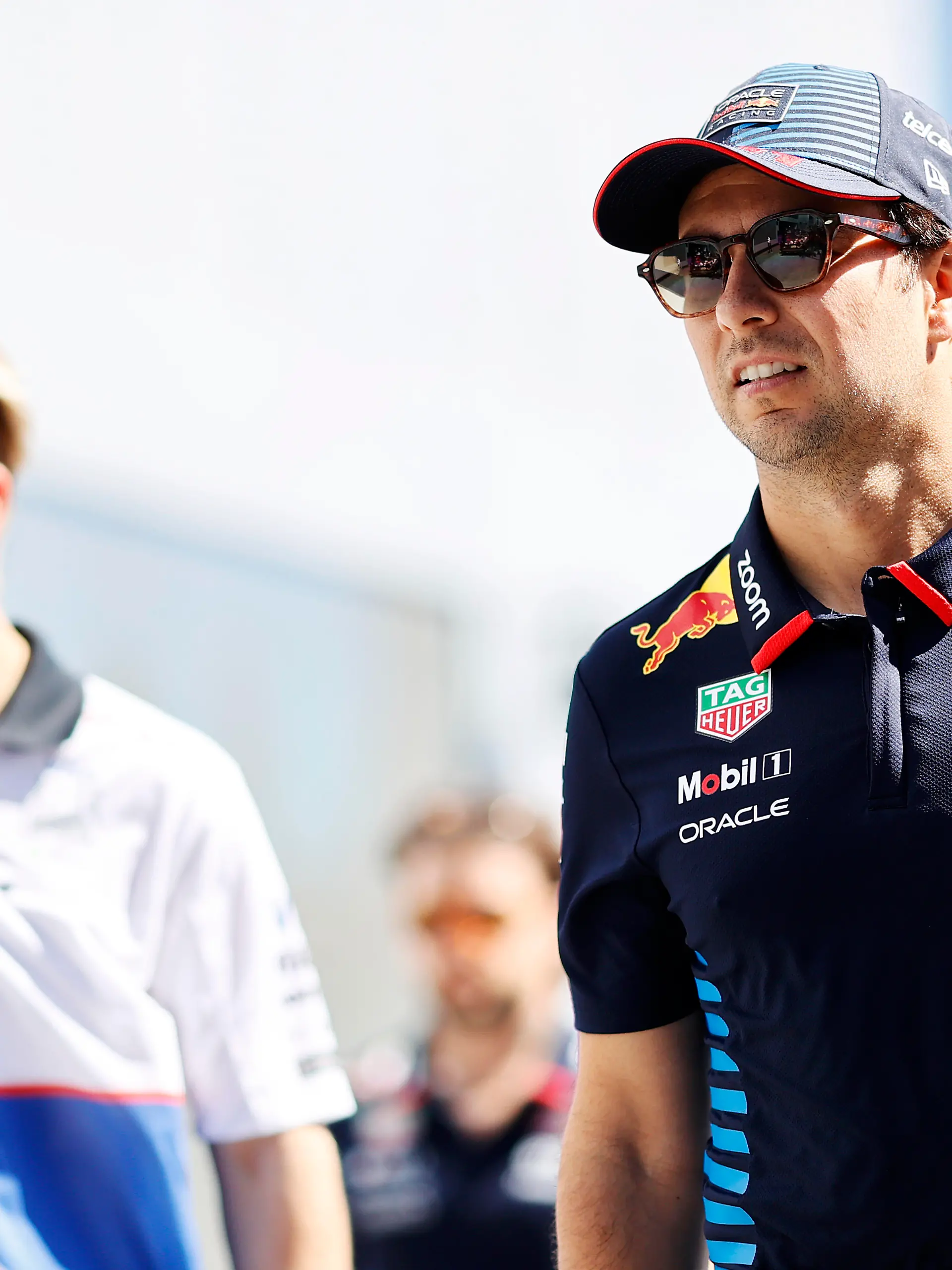 Liam Lawson (l) und Sergio Perez geraten in Mexiko aneinander.
