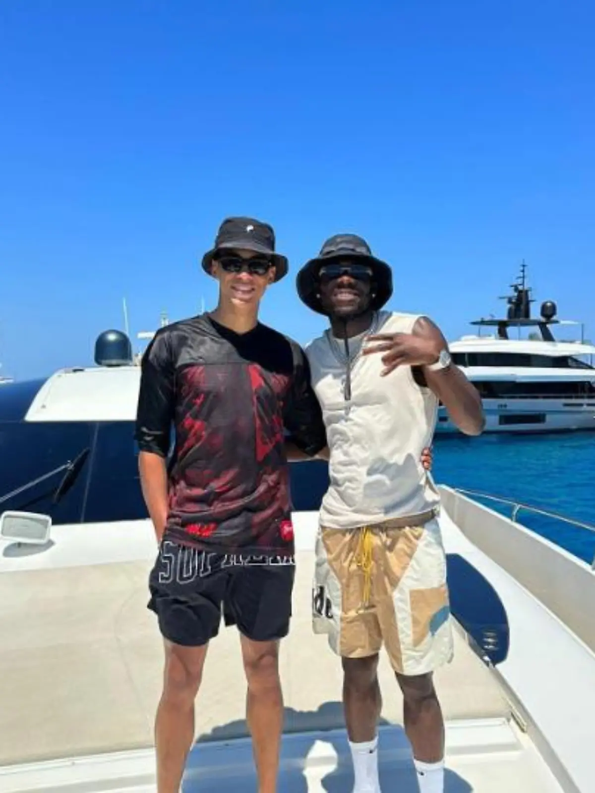 Jamal Musiala (l.) und Alphonso Davies