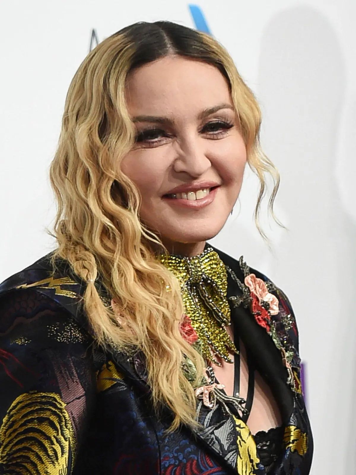 FILE - In this Dec. 9, 2016 file photo, Madonna attends the 11th Annual Billboard Women in Music honors in New York. Madonna will direct a biopic about herself for Universal Pictures. Madonna will direct and co-write with “Juno” screenwriter Diablo Cody. (Photo by Evan Agostini/Invision/AP, File)
