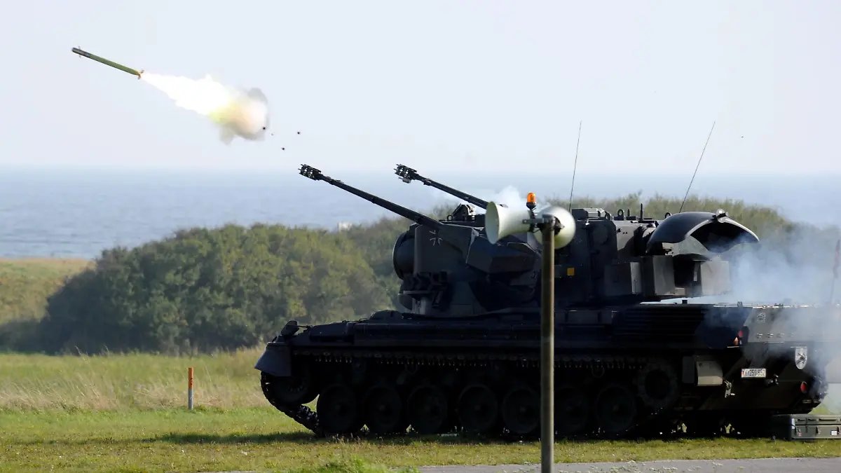 (dpa file) - A file picture dated 06 October 2010 shows a Gepard air defence tank firing a Stinger rocket at the firing range in Todendorf, Germany. On 12 March 2012, the Chief of Staff will decommission the German Army's air defence in Todendorf at the Baltic Sea. The squad's tasks will be performed by the German Air Force. Photo: Carsten Rehder