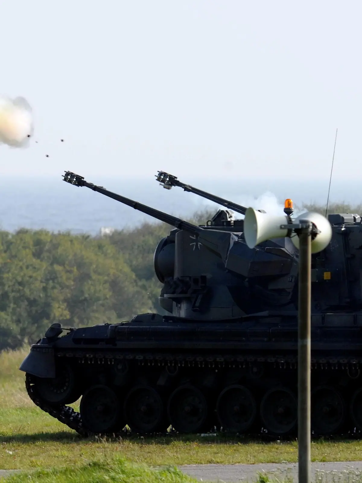 (dpa file) - A file picture dated 06 October 2010 shows a Gepard air defence tank firing a Stinger rocket at the firing range in Todendorf, Germany. On 12 March 2012, the Chief of Staff will decommission the German Army's air defence in Todendorf at the Baltic Sea. The squad's tasks will be performed by the German Air Force. Photo: Carsten Rehder