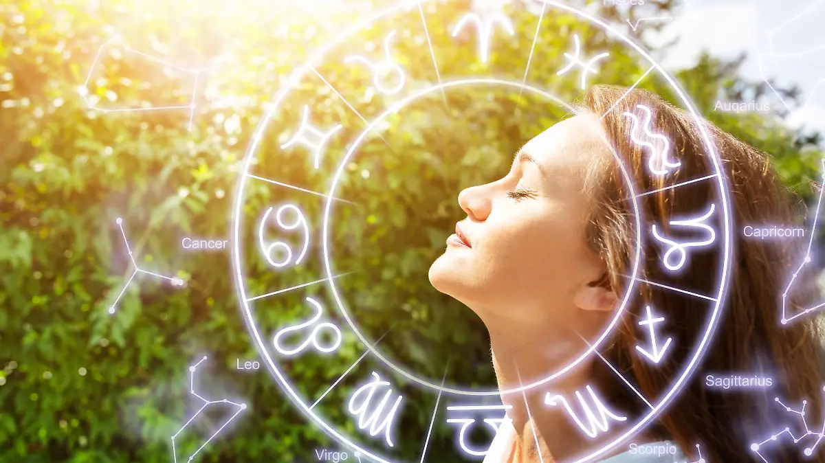 Side View Of Beautiful Young Woman Closing Her Eyes And Breathing Clean Fresh Air