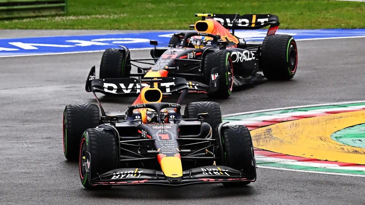 IMOLA, ITALY - APRIL 24: Max Verstappen of the Netherlands driving the (1) Oracle Red Bull Racing RB18 leads Sergio Perez of Mexico driving the (11) Oracle Red Bull Racing RB18 during the F1 Grand Prix of Emilia Romagna at Autodromo Enzo e Dino Ferrari on April 24, 2022 in Imola, Italy. (Photo by Clive Mason/Getty Images)