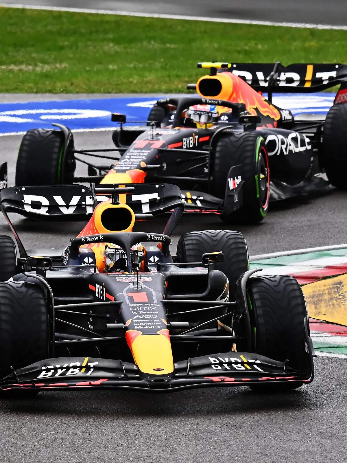 IMOLA, ITALY - APRIL 24: Max Verstappen of the Netherlands driving the (1) Oracle Red Bull Racing RB18 leads Sergio Perez of Mexico driving the (11) Oracle Red Bull Racing RB18 during the F1 Grand Prix of Emilia Romagna at Autodromo Enzo e Dino Ferrari on April 24, 2022 in Imola, Italy. (Photo by Clive Mason/Getty Images)