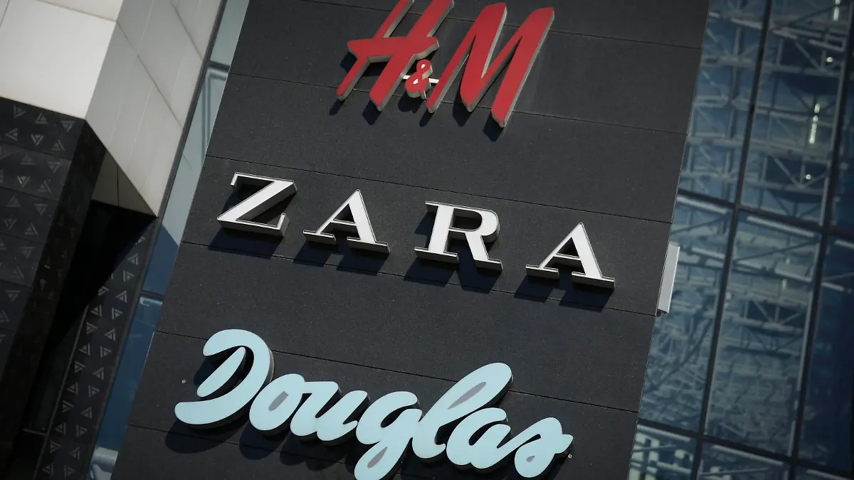 Shop logos are seen at the entrance of the Plac Unii shopping center in Warsaw, Poland on April 22, 2018. (Photo by Jaap Arriens/NurPhoto)