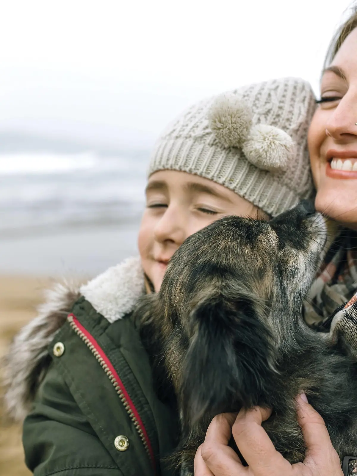 Mother and daughter hugging their dog on the beach in winter model released Symbolfoto property released PUBLICATIONxINxGERxSUIxAUTxHUNxONLY DAPF00592

Mother and Daughter HUGGING their Dog ON The Beach in Winter Model released Symbolic image Property released PUBLICATIONxINxGERxSUIxAUTxHUNxONLY DAPF00592  