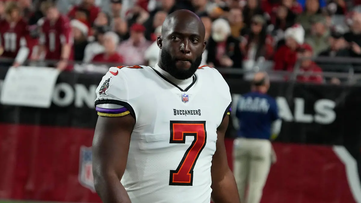FILE - Tampa Bay Buccaneers running back Leonard Fournette (7) is shown during the second half of an NFL football game against the Arizona Cardinals, Sunday, Dec. 25, 2022, in Glendale, Ariz. Fournette appears to have avoided injury after his car caught fire while he was driving on a freeway. Fournette posted a video to Instagram on Tuesday, June 27, 2023, where he showed his burned vehicle on the side of the highway. Fournette, who was a first-round pick by Jacksonville in 2017, is currently a free agent after being released by the Bucs during the offseason in a salary cap move. (AP Photo/Rick Scuteri, File)