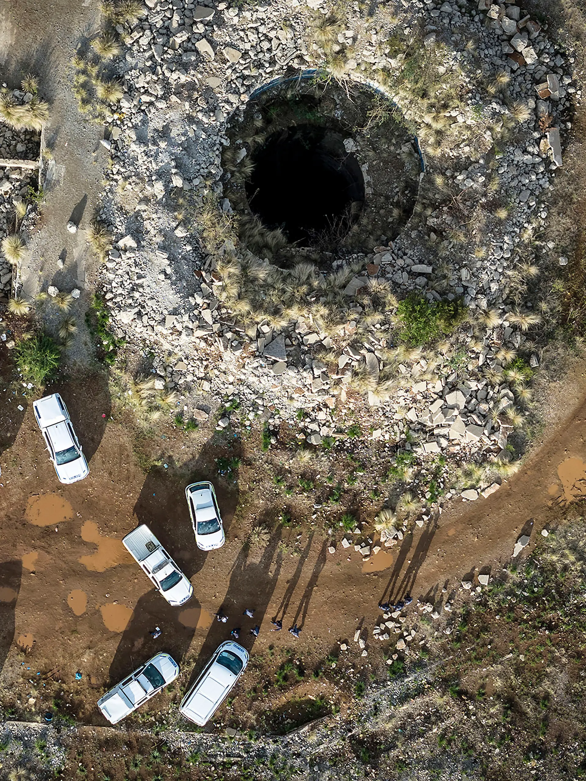 An aerial view of a mine shaft where an estimated 4000 illegal miners are trapped in a disused mine in Stilfontein, South Africa, Wednesday, Nov.13, 2024. (AP Photo)