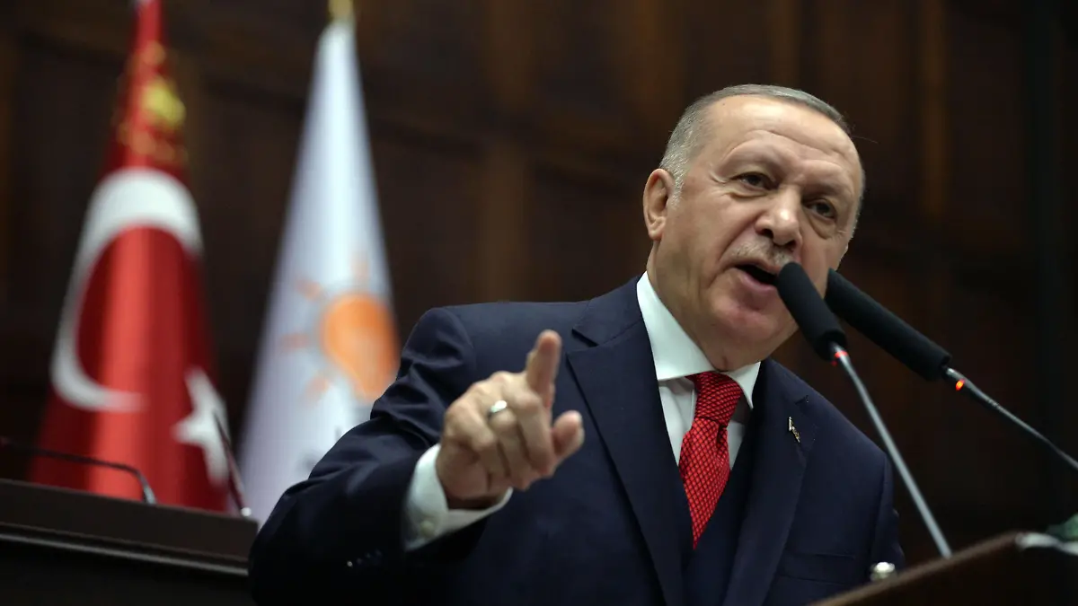 News Bilder des Tages 200114 -- ANKARA, Jan. 14, 2020 Xinhua -- Turkish President Recep Tayyip Erdogan speaks to his party members at the parliament in Ankara, Turkey, on Jan. 14, 2020. Recep Tayyip Erdogan warned on Tuesday that Turkey would teach a lesson to Khalifa Haftar, commander of Libya s east-based army, if his forces resume fighting. Photo by Mustafa Kaya/Xinhua TURKEY-ANKARA-PRESIDENT-LIBYA PUBLICATIONxNOTxINxCHN
