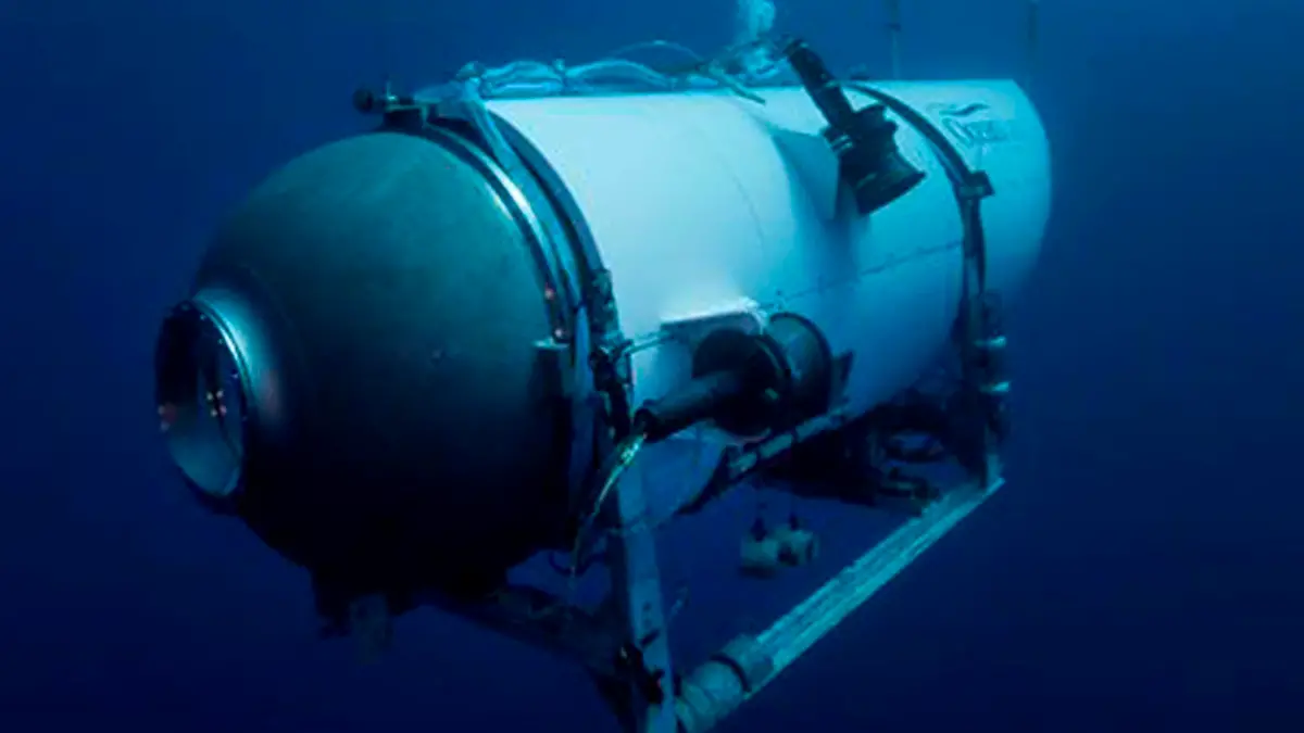 FILE - This undated image provided by OceanGate Expeditions in June 2021 shows the company's Titan submersible. The wrecks of the Titanic and the Titan sit on the ocean floor, separated by 1,600 feet (490 meters) and 111 years of history. How they came together unfolded over an intense week that raised temporary hopes and left lingering questions. (OceanGate Expeditions via AP, File)