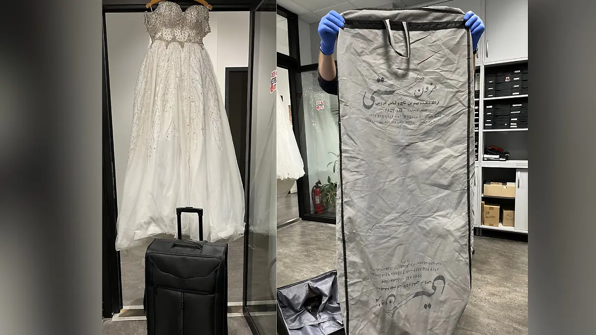 Kleid, Koffer und Kleiderhülle