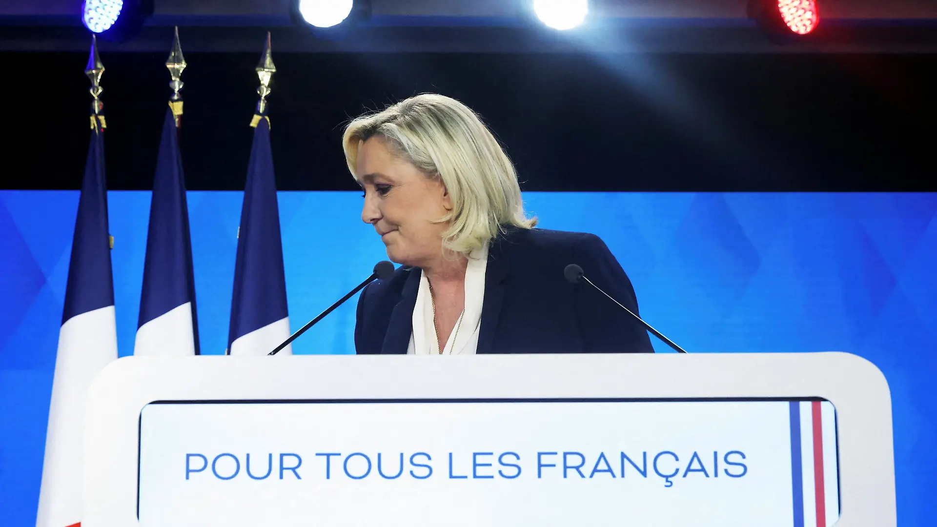 Marine Le Pen, French far-right National Rally (Rassemblement National) party candidate for the 2022 French presidential election, looks dejected after her defeat in the second round of the 2022 French presidential election, at the Pavillon d'Armenonville, in Paris, France, April 24, 2022. REUTERS/Yves Herman TPX IMAGES OF THE DAY