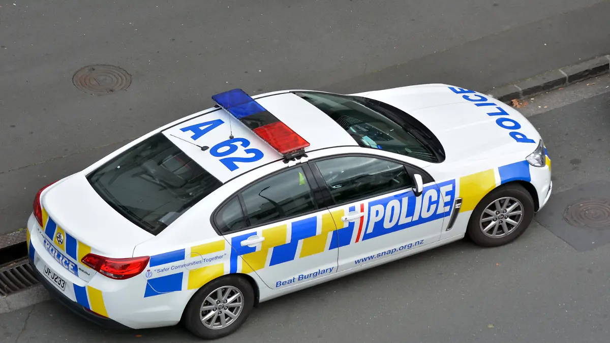 AUCKLAND - MAR 30 2017:New Zealand Police car and officer during a crime respond in Auckland, New Zealand.