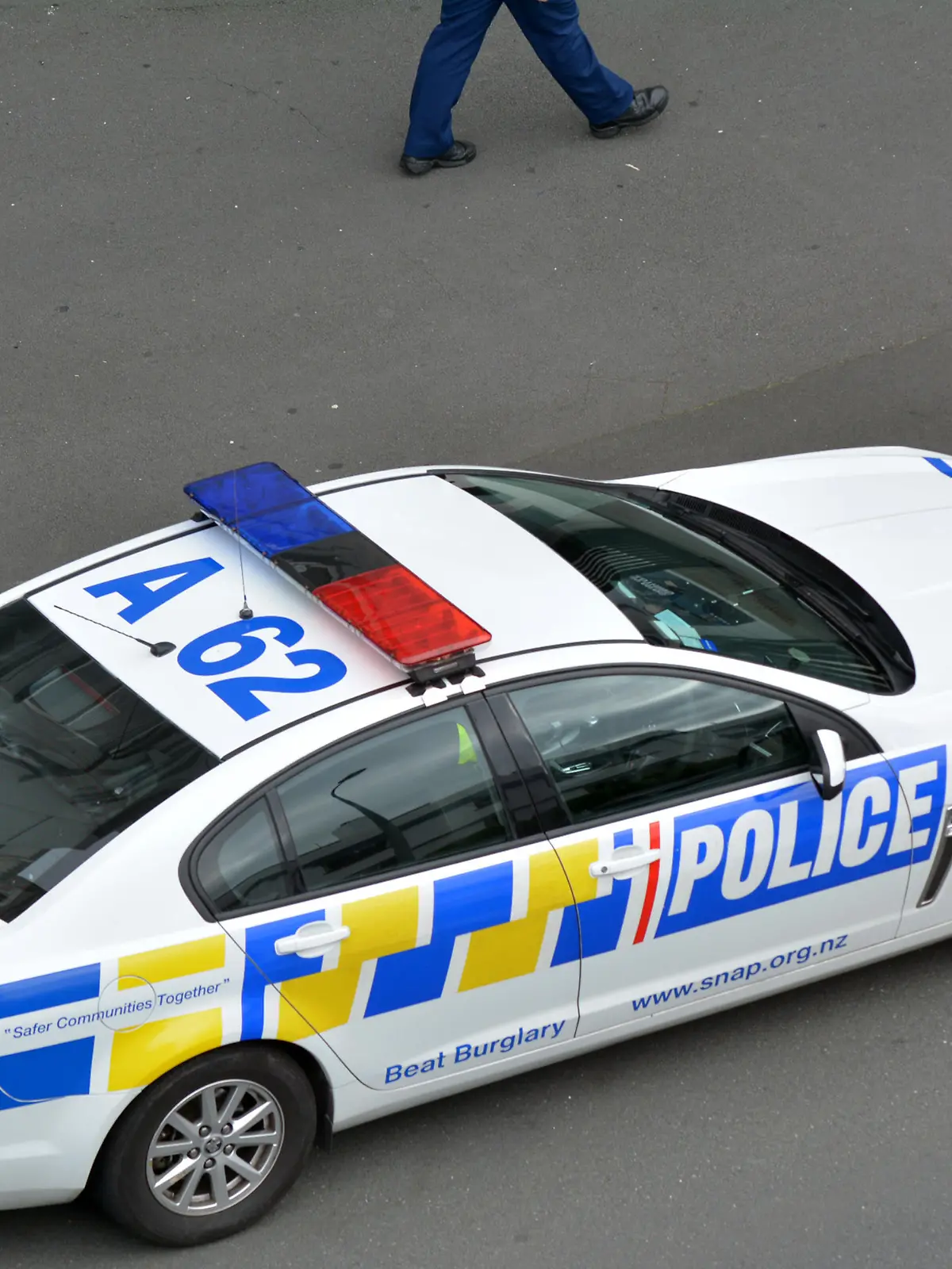 AUCKLAND - MAR 30 2017:New Zealand Police car and officer during a crime respond in Auckland, New Zealand.