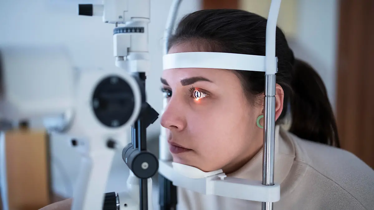 Close up of woman having eye tested in specialized hospital.