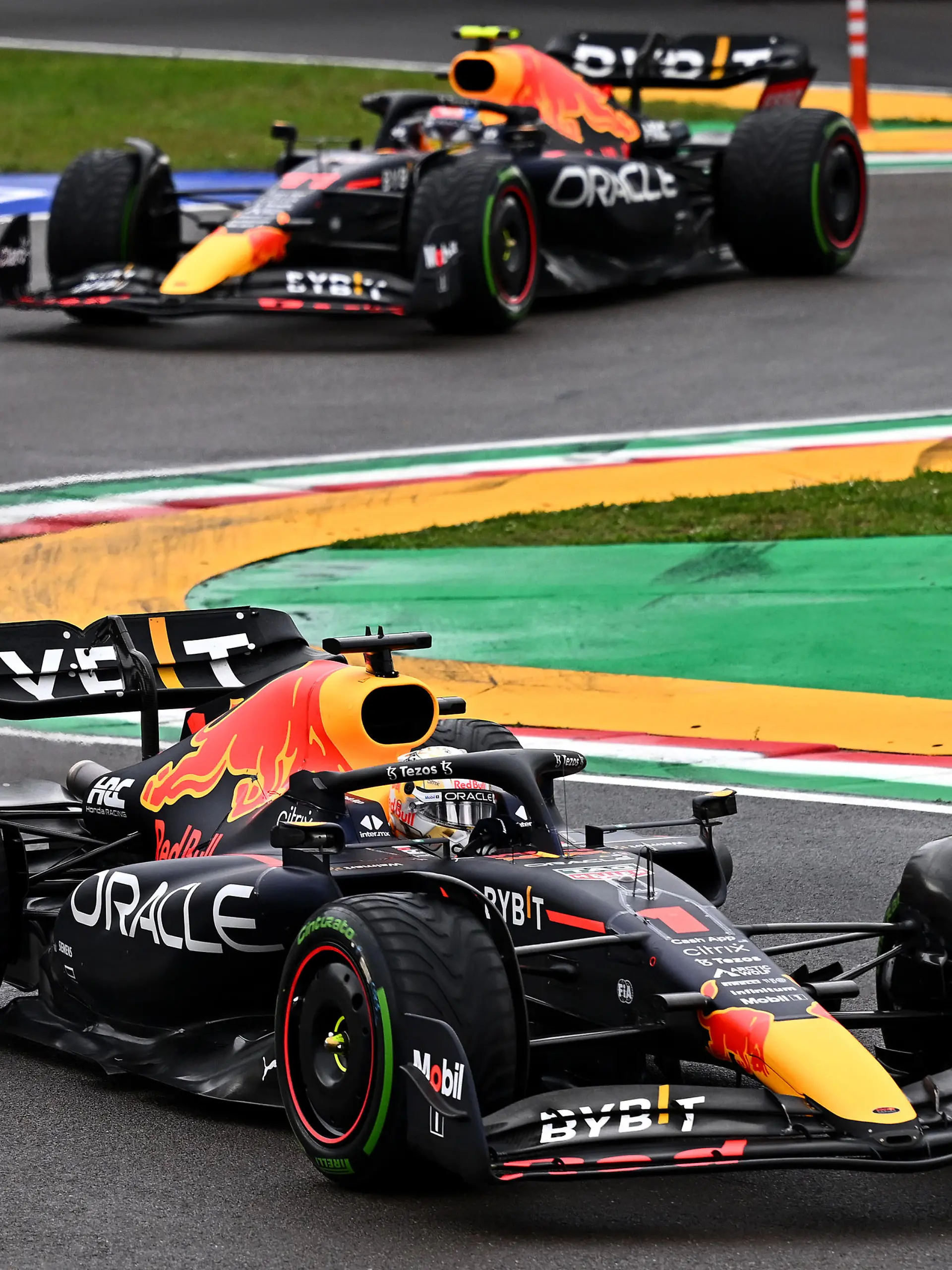 IMOLA, ITALY - APRIL 24: Max Verstappen of the Netherlands driving the (1) Oracle Red Bull Racing RB18 leads Sergio Perez of Mexico driving the (11) Oracle Red Bull Racing RB18 during the F1 Grand Prix of Emilia Romagna at Autodromo Enzo e Dino Ferrari on April 24, 2022 in Imola, Italy. (Photo by Clive Mason/Getty Images)