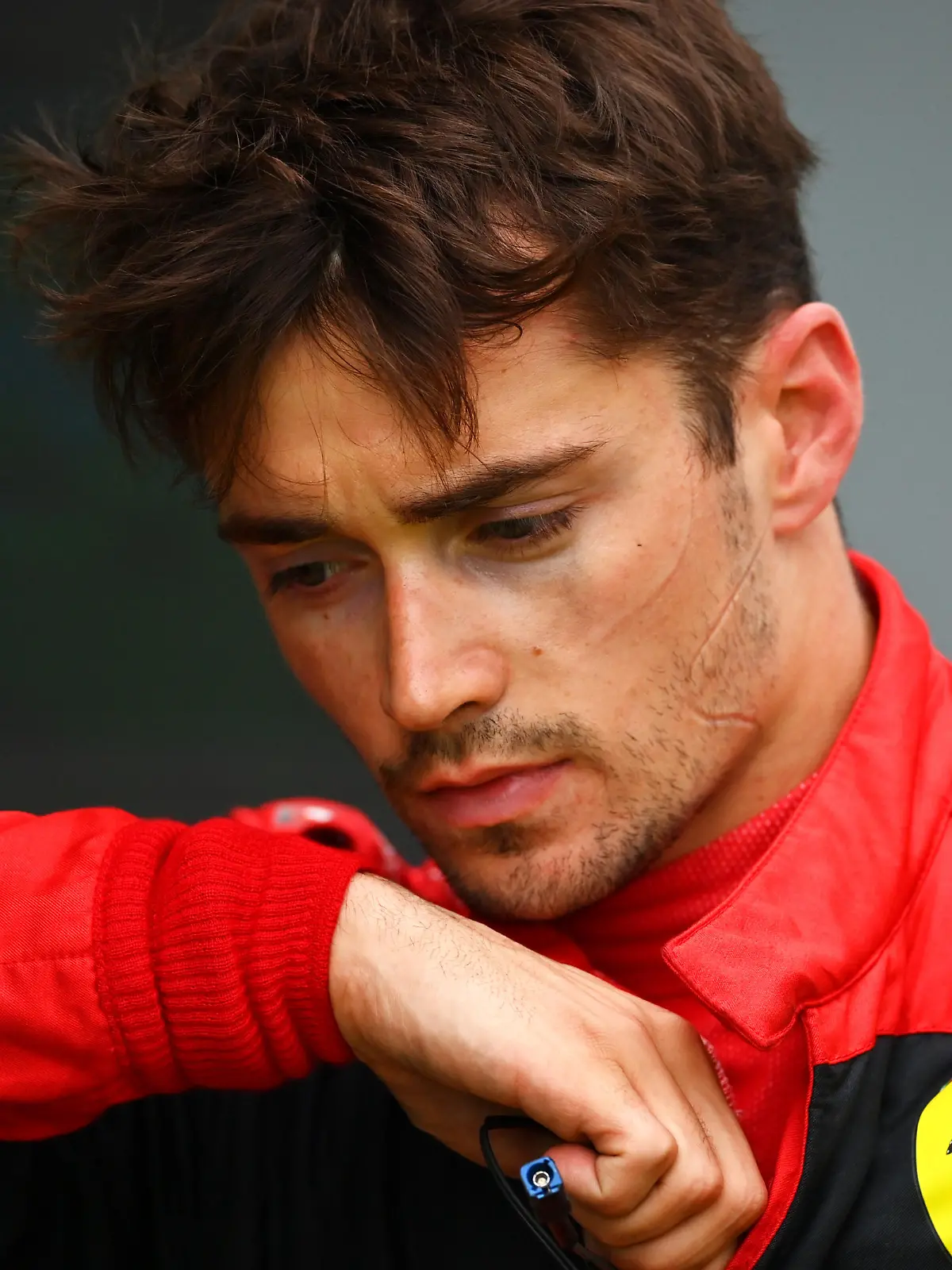 IMOLA, ITALY - APRIL 24: 6th placed Charles Leclerc of Monaco and Ferrari looks dejected in parc ferme after spinning out from third position with 10 laps remaining during the F1 Grand Prix of Emilia Romagna at Autodromo Enzo e Dino Ferrari on April 24, 2022 in Imola, Italy. (Photo by Dan Mullan/Getty Images)