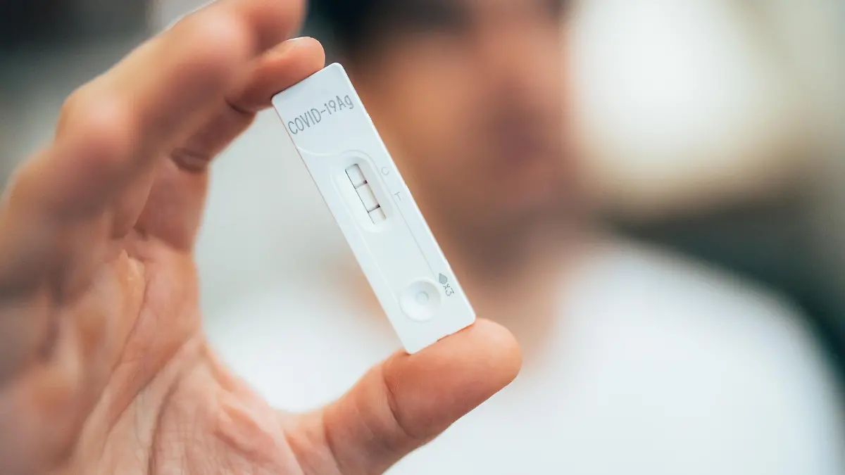 Positive test result by using rapid test for COVID-19, quick fast antibody point of care testing