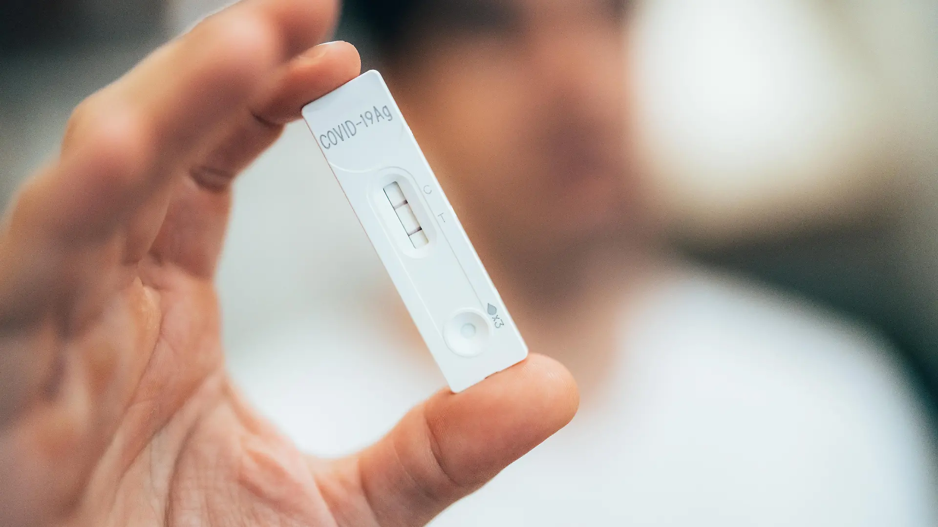Positive test result by using rapid test for COVID-19, quick fast antibody point of care testing
