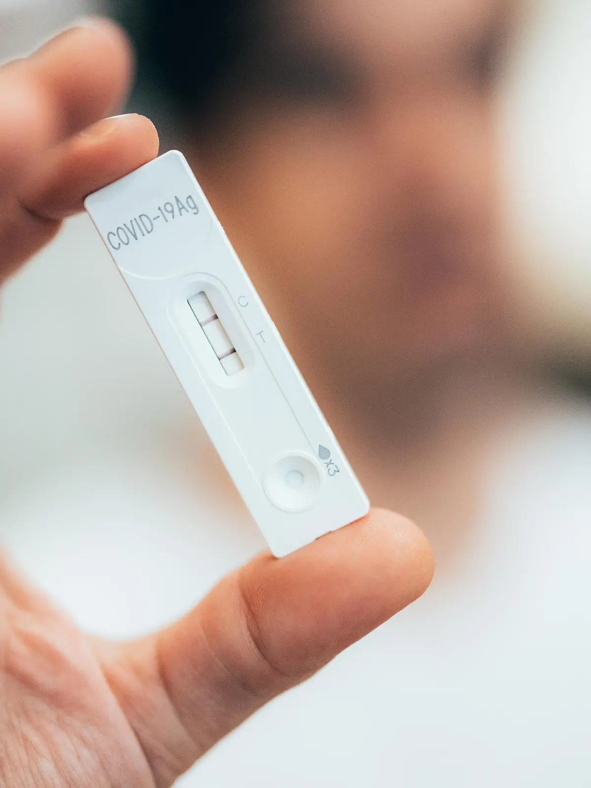 Positive test result by using rapid test for COVID-19, quick fast antibody point of care testing