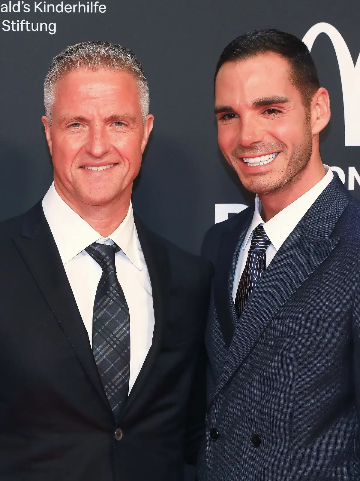 Ralf Schumacher und Etienne Bousquet-Cassagne bei der McDonalds Benefitz Gala in den Eisbach Studios in München