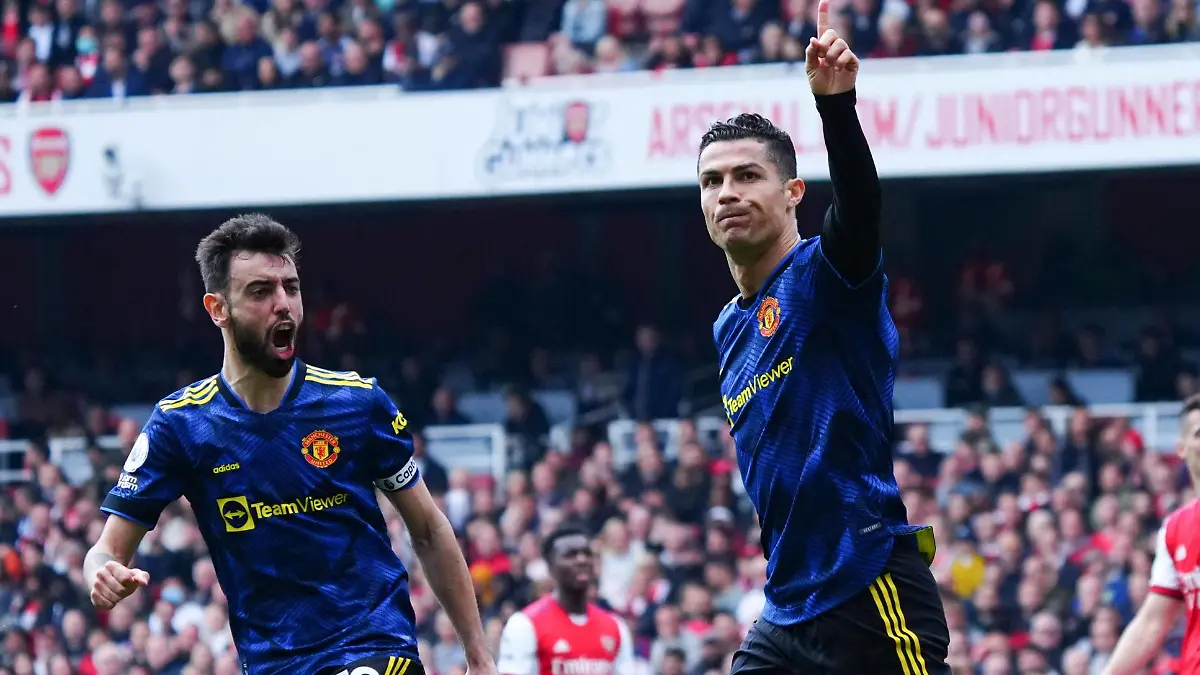  Mandatory Credit: Photo by Javier Garcia/Shutterstock 12905316j Cristiano Ronaldo of Manchester United, ManU celebrates scoring a goal after making it 1-2 Arsenal v Manchester United, Premier League, Football, Emirates Stadium, London, UK - 23 Apr 2022 EDITORIAL USE ONLY No use with unauthorised audio, video, data, fixture lists, club/league logos or live services. Online in-match use limited to 120 images, no video emulation. No use in betting, games or single club/league/player publications. Arsenal v Manchester United, Premier League, Football, Emirates Stadium, London, UK - 23 Apr 2022 EDITORIAL USE ONLY No use with unauthorised audio, video, data, fixture lists, club/league logos or live services. Online in-match use limited to 120 images, no video emulation. No use in betting, games or single club/league/player publications. PUBLICATIONxINxGERxSUIxAUTXHUNxGRExMLTxCYPxROMxBULxUAExKSAxONLY Copyright: xJavierxGarcia/Shutterstockx 12905316j